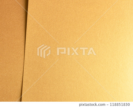 Golden metallic paper with a rich, glossy texture and shiny surface. The elegant, layered design Golden metallic paper with a rich, glossy texture and shiny surface. The elegant, layered design 118851830