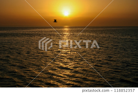 Red sunset over the Red Sea off the coast of Egypt 118852357