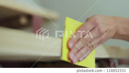 Woman cleaning the steps of a new house. 118852531