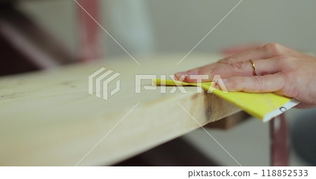 Woman cleaning the steps of a new house. 118852533