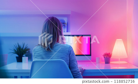 Workplace in a minimalist style, a buyer in front of a computer monitor waiting for the start of sales, bright neon lighting of the space 118852716