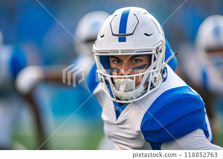 Student football team match, portrait of an athlete during the game natural light on a bright sunny day Student football team match, portrait of an athlete during the game natural light on a bright sunny day 118852763