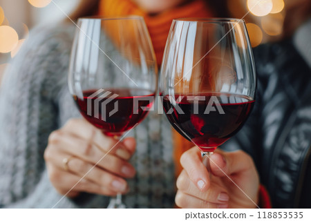 Friends clink glasses with young red wine, fair and tasting, view and meeting of friends 118853535