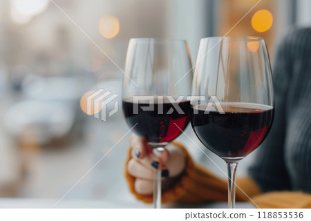 Poster with two glasses of red wine on the table in a wine bar, local wine advertising concept 118853536