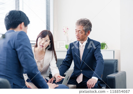 A male businessman being punished for a scandal 118854087