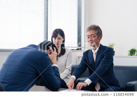 A male businessman being punished for a scandal 118854099