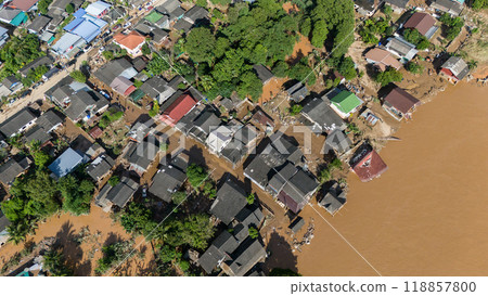 Aerial view of Karen Ruammit Elephant Camp village in Chiang Rai province of Thailand flooded by river after typhoon Yagi swept across Thailand. 118857800