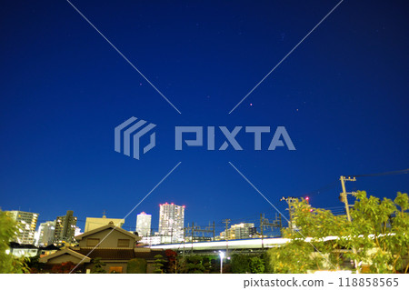 Stars spreading over the city Stars spreading over the city 118858565