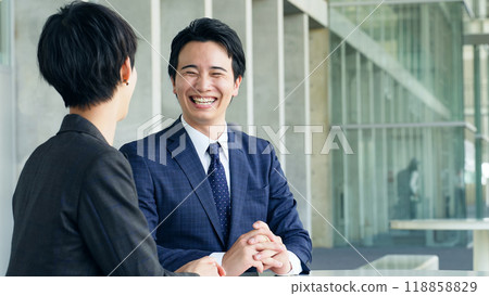 Business person talking in the office Business person talking in the office 118858829