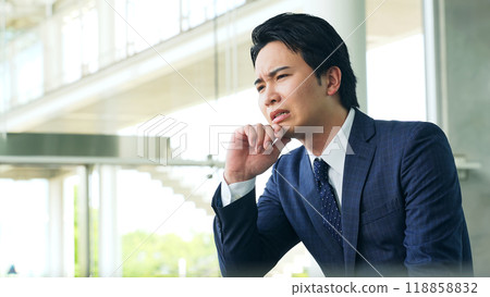Thinking businessman Thinking businessman 118858832