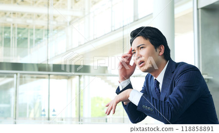 depressed businessman 118858891