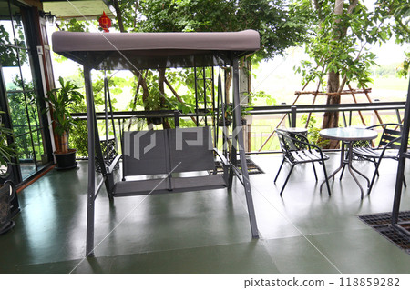 Empty swing for sitting in a cafe. 118859282