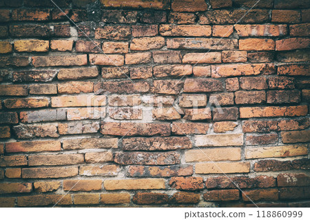 Surface of the red brick wall is very old, damaged, dirty and covered with black mold. Surface of the red brick wall is very old, damaged, dirty and covered with black mold. 118860999