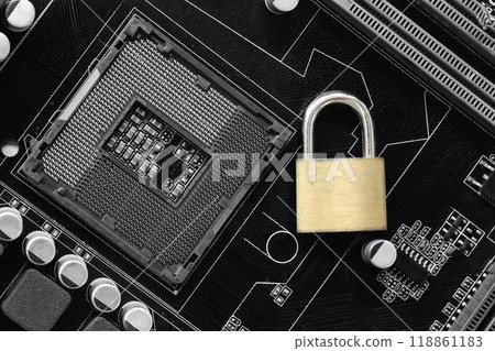 Golden master key in lock placed on a computer motherboard background. 118861183