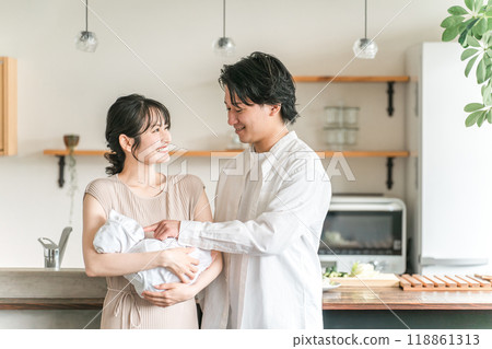 Young Japanese couple with baby, happy married life, newlyweds Young Japanese couple with baby, happy married life, newlyweds 118861313