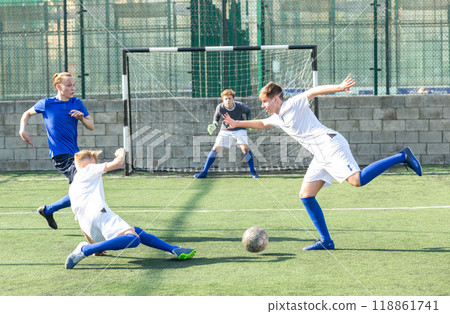 Young football players fighting for ball 118861741