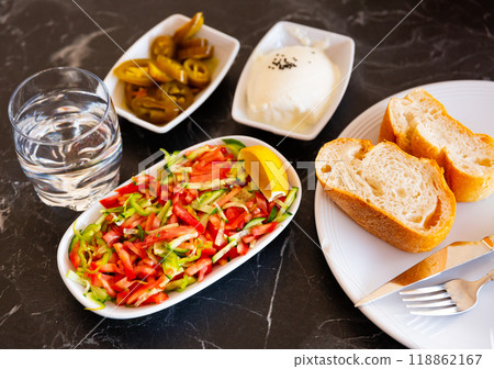 Vegetable salad and cheese. Traditional Turkish vegetable dish. Served before main courses Vegetable salad and cheese. Traditional Turkish vegetable dish. Served before main courses 118862167