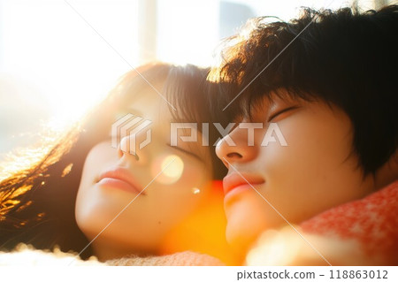 Couple relaxing by the window 118863012