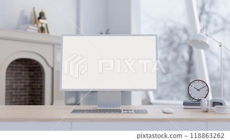 A close-up of a computer mockup on a minimalist table in a contemporary white living room. 118863262