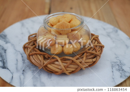 a traditional cake from Indonesia called kue sus filled with cream puffs 118863454