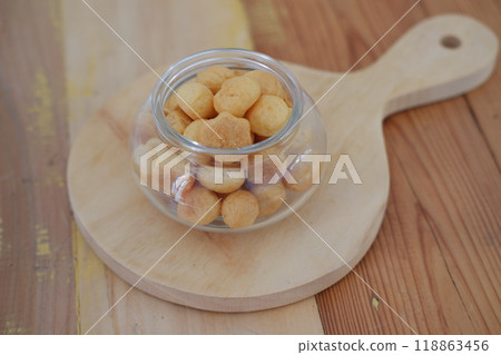 a traditional cake from Indonesia called kue sus filled with cream puffs 118863456
