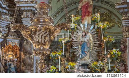 Ornate interior altar of a historic Catholic church 118863524