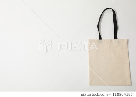 A white bag lies on a white background 118864195
