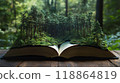 Book surrounded by lush green trees.	 118864819