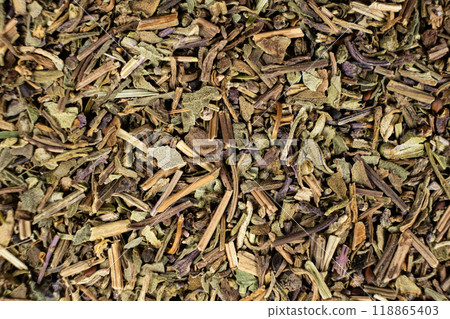 Dry basil spice seasoning macro texture top view 118865403
