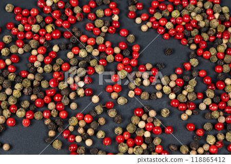 A mixture of different peppercorns white, black, red and green peppers spices. A mixture of different peppercorns white, black, red and green peppers spices. 118865412