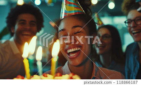Cheerful office employee celebrating his birthday. 118866187