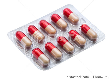 Medical pills in blister pack isolated on white background. Metal tablet blister. Silver blister with drugs 118867939