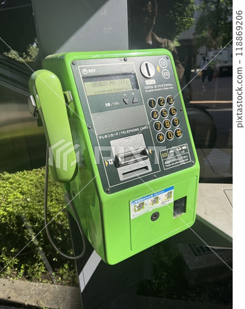 A well-used public telephone 118869206