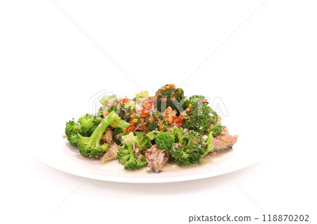 Broccoli and mackerel aglio e olio on a light background Broccoli and mackerel aglio e olio on a light background 118870202