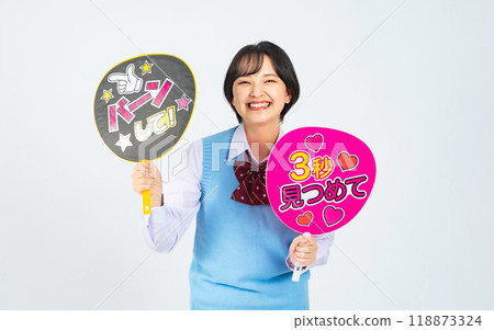 Female student holding a fan Female student holding a fan 118873324