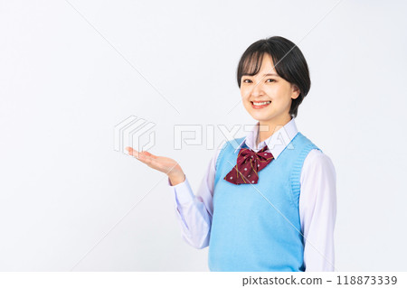 A female student wearing a uniform to guide A female student wearing a uniform to guide 118873339