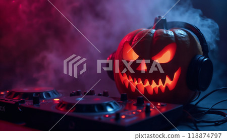 Pumpkins like a DJ with headphones are making a party and playing on the DJ console, a dark environment in multicolored smoke and lights 118874797