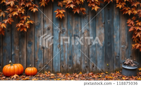 Halloween decorations with pumpkins on the background of a wooden wall, autumn season 118875036