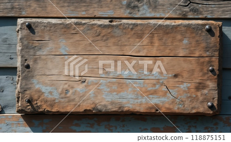 an empty sign board on the background of a fence, made of wood, old and weathered plaque 118875151