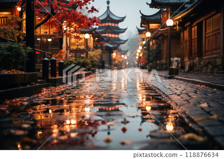 old town on a late rainy evening, wet pavement, street lights, old architecture in Japanese or Chinese style 118876634