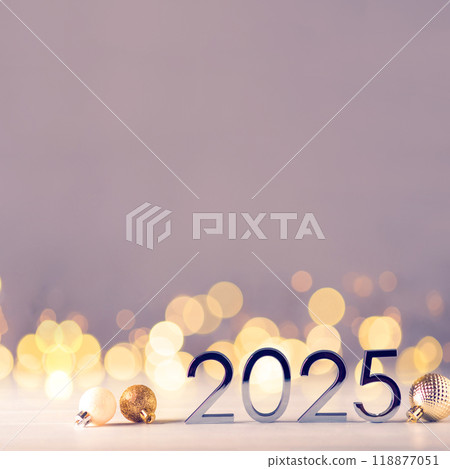 Metal numbers 2025 on table with bokeh lights. 118877051
