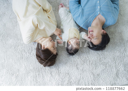 A family relaxing in the living room 118877662