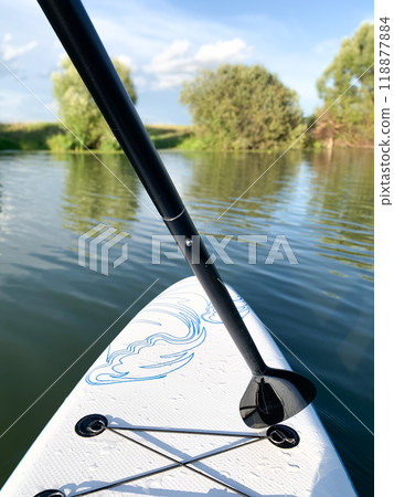 A sup board on the body of the lake. A sup board on the body of the lake. 118877884