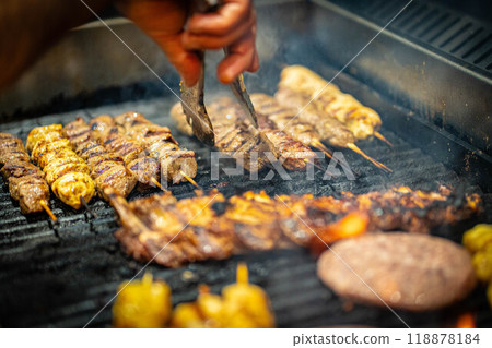 Grilled Kebab From Fresh Meat Pork Cooking On Metal Skewer Outdoors grill steak Grilled Kebab From Fresh Meat Pork Cooking On Metal Skewer Outdoors grill steak 118878184
