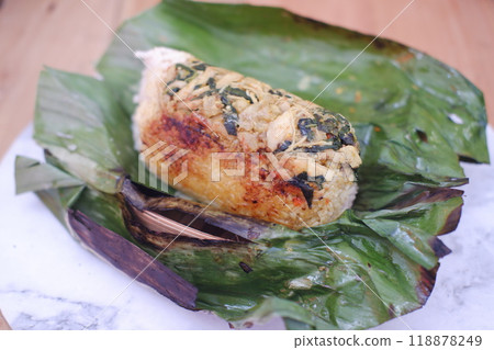 Grilled rice served on a wooden table. Grilled rice served on a wooden table. 118878249