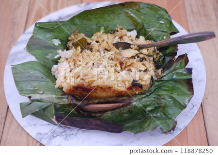 Grilled rice served on a wooden table. 118878250