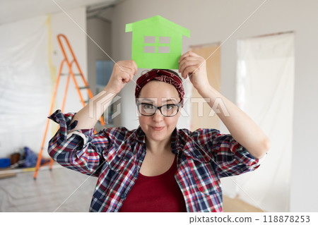 A Woman Engaged in Exciting Home Renovation Projects Using Innovative and Creative Ideas 118878253