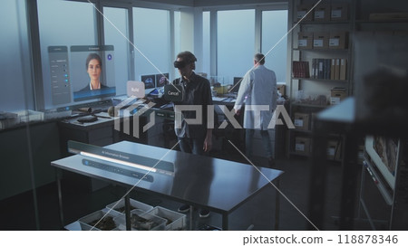 VFX animation of hologram with AI assistant and dinosaur skull in archaeological lab 118878346