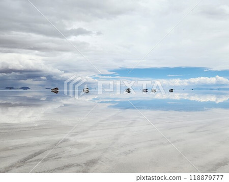 Several 4x4 vehicles driving across Salar de Uyuni Salt Lake, Bolivia Several 4x4 vehicles driving across Salar de Uyuni Salt Lake, Bolivia 118879777