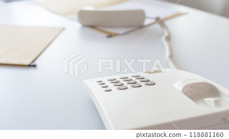 Landline telephone with handset of the hook 118881160